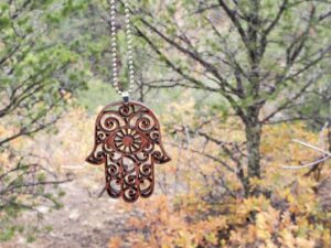 The Hamsa Hand • Sign of Protection • Power • Strength • Pendant Chain Necklace / Jewelry / Ornament / Décor • Wooden Creation • Mr. & Mrs. Aircrete-Harry